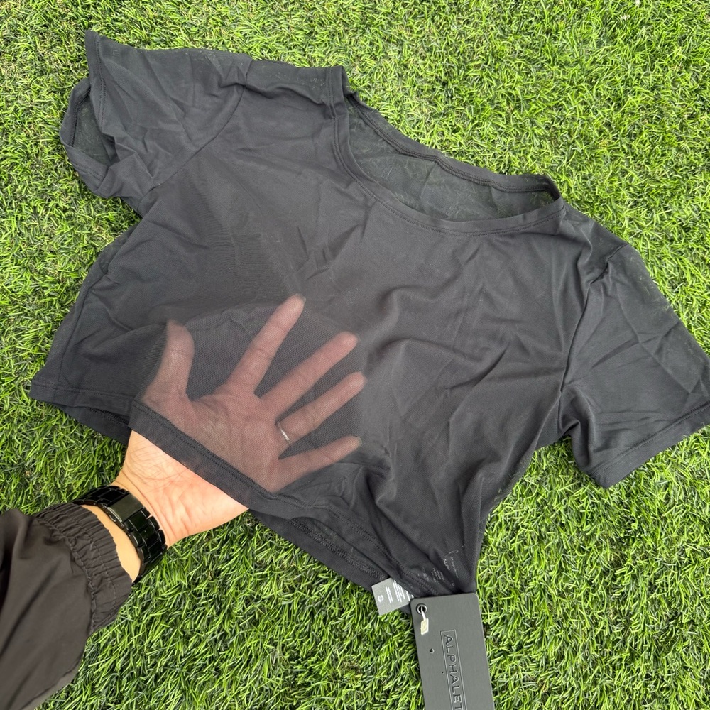 Alphalete Black Sheer Crop Tee with Mesh Hem